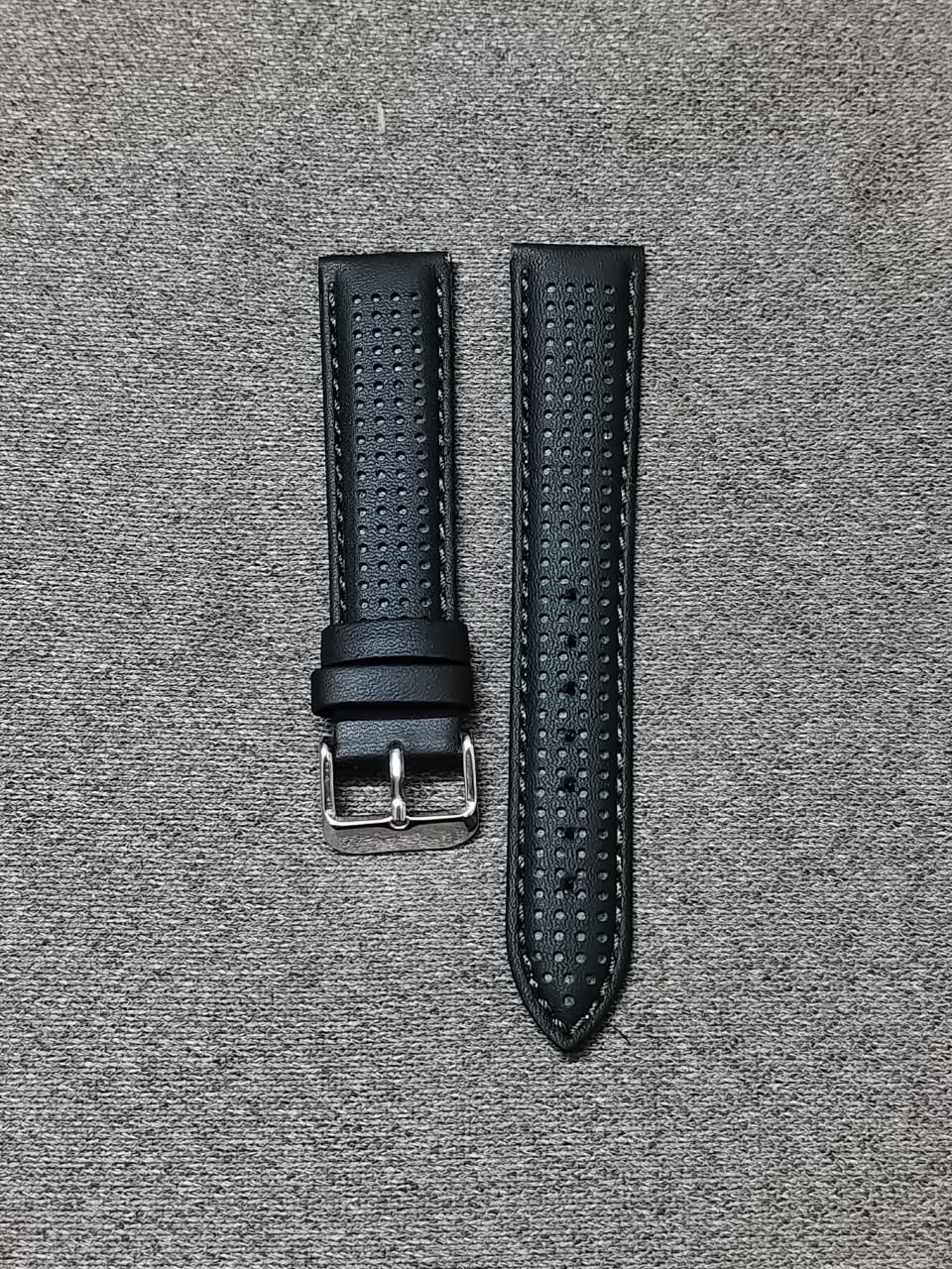 Black perforated Italian leather racing watch strap with Green stitching and stainless steel buckle, available in 20mm, 22mm, and 24mm sizes
