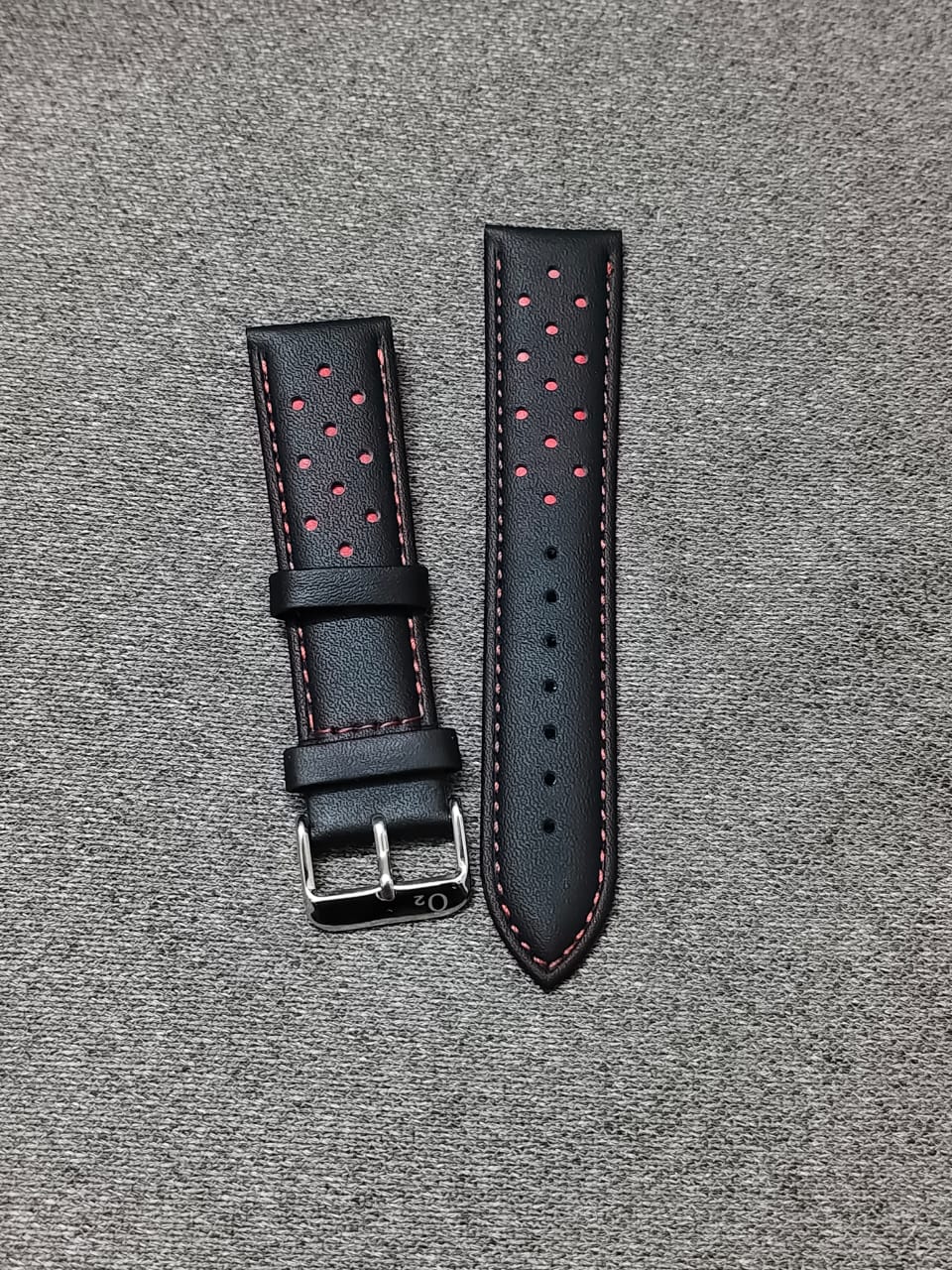 Black Italian leather racing watch strap with red stitching, perforated design, and stainless steel buckle in 20mm, 22mm, and 24mm sizes