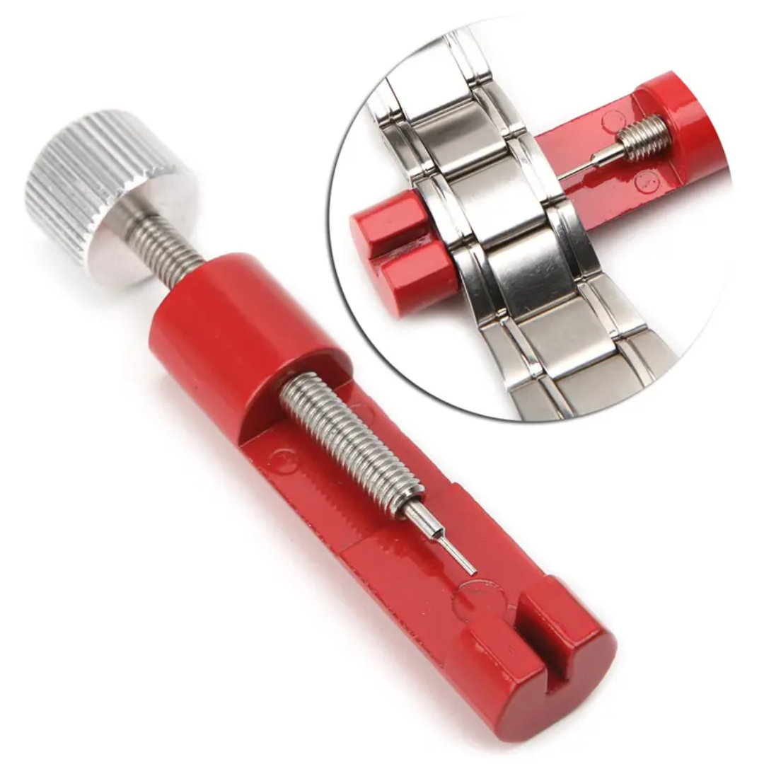 Red adjustable watch band link pin remover tool with metal screw, shown removing a pin from a stainless steel watch